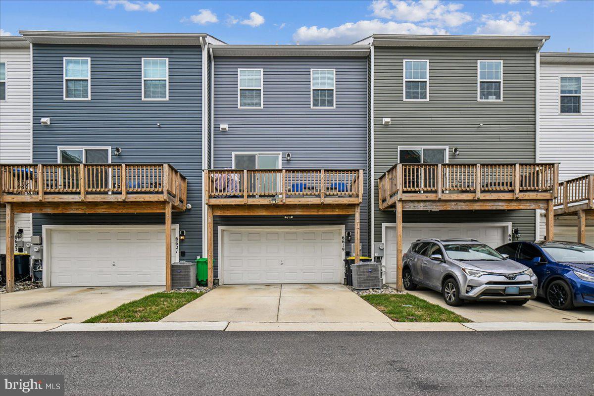 6619 Darter Way Clinton, MD 20735 - Photo 2 of 20 Rear Exterior with Garage & Deck