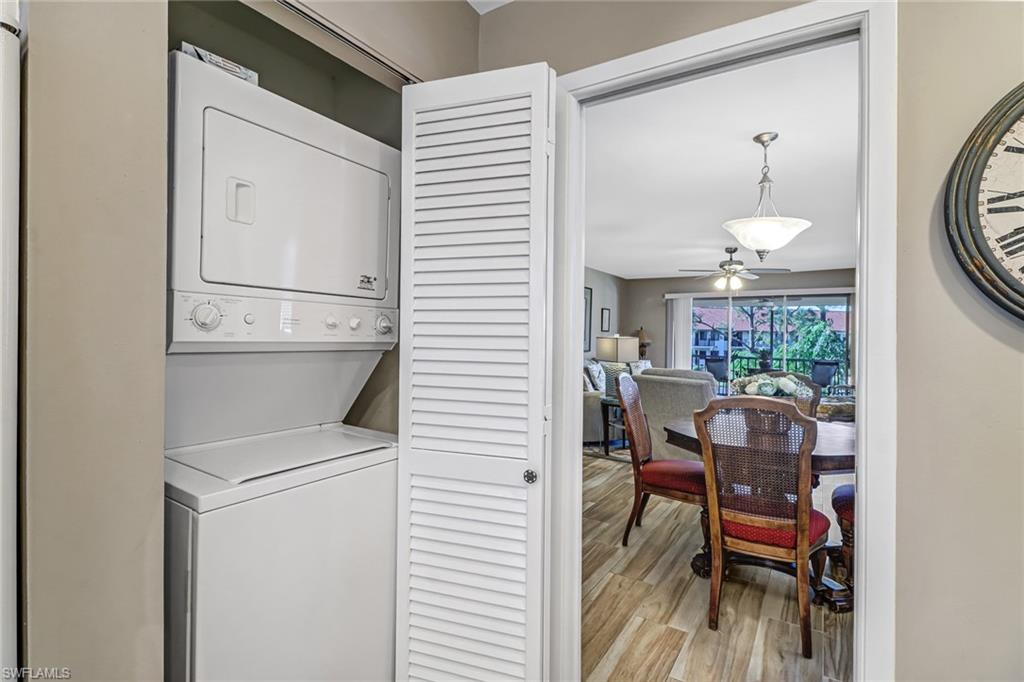 600 Valley Stream Drive, Unit E8 Naples, FL 34113 - Photo 20 of 21 a view of a hallway with workspace and entryway
