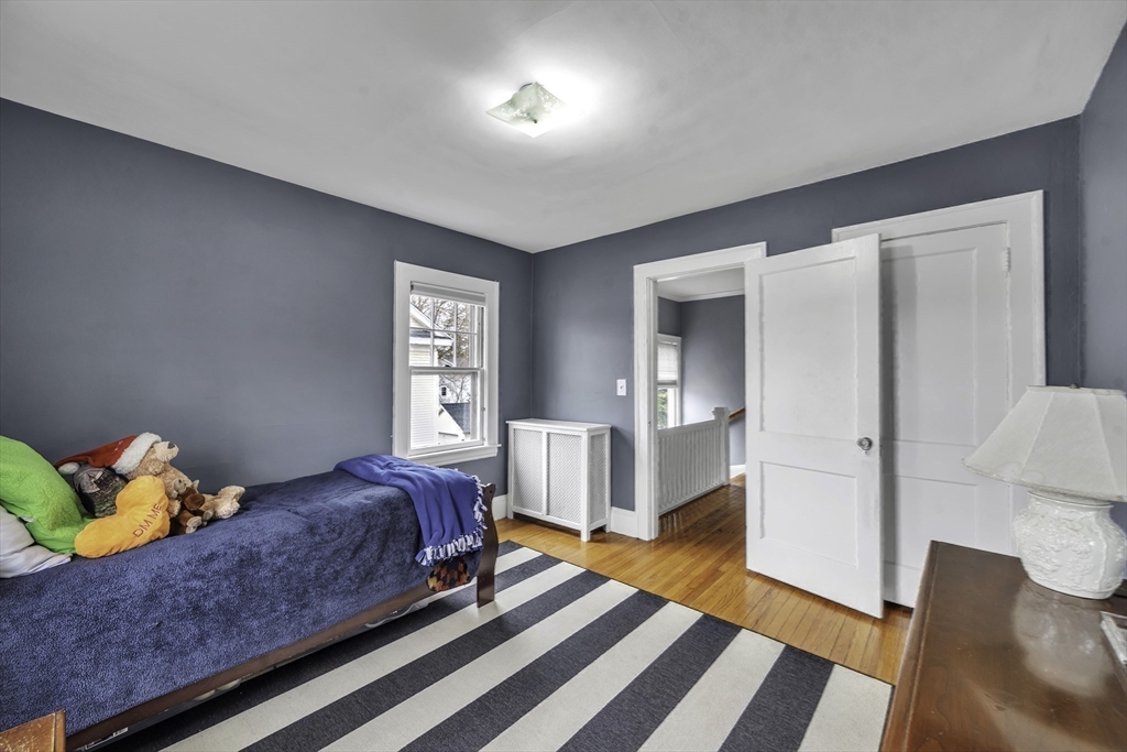 138 Maple Road Longmeadow, MA 01106 - Photo 25 of 37 a bedroom with bed and window