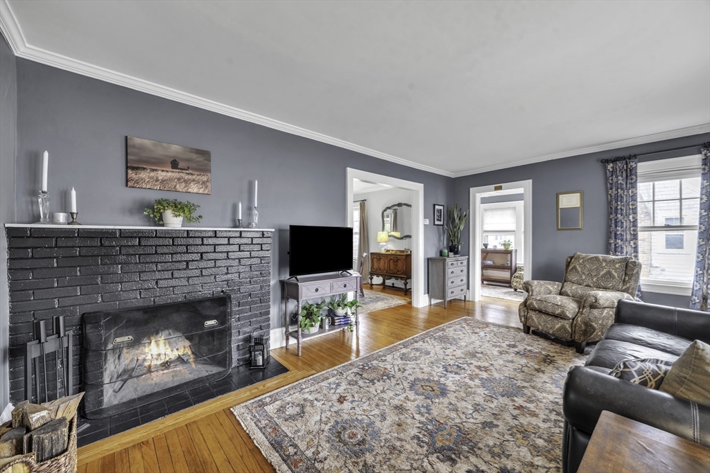 138 Maple Road Longmeadow, MA 01106 - Photo 8 of 37 a living room with furniture and a fireplace