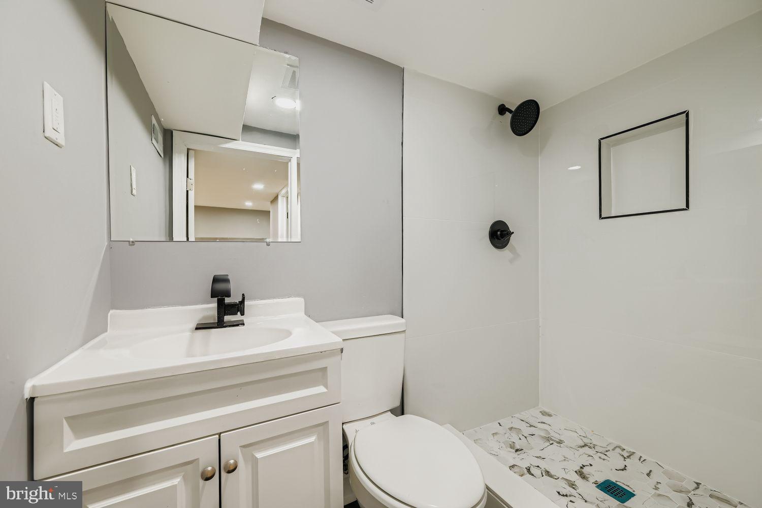 1520 Appleton Street Baltimore, MD 21217 - Photo 22 of 31 Full bath with sleek modern tile and fixtures