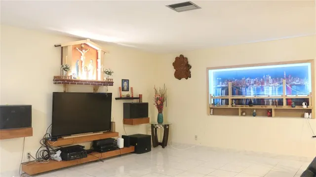 a view of a living room and bathroom