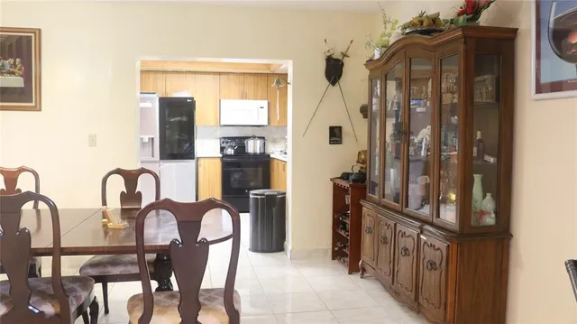 a close view of a dining table chairs