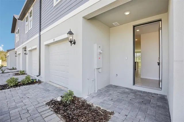 a view of a front door and a hallway