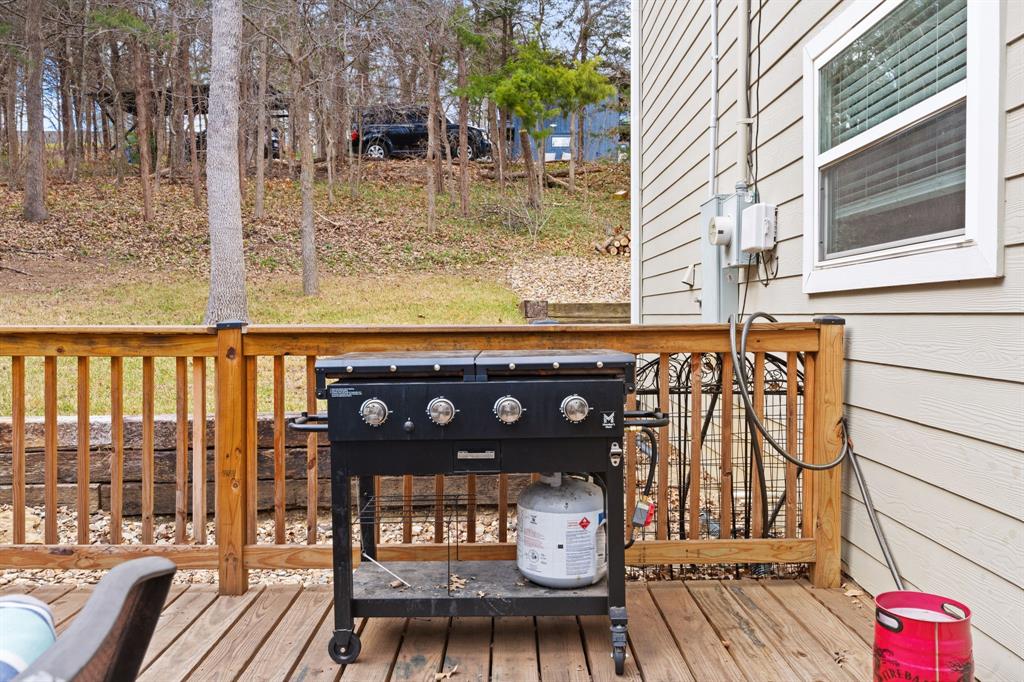 150 Spanish Trail Pottsboro, TX 75076 - Photo 23 of 36 a view of a balcony with chairs