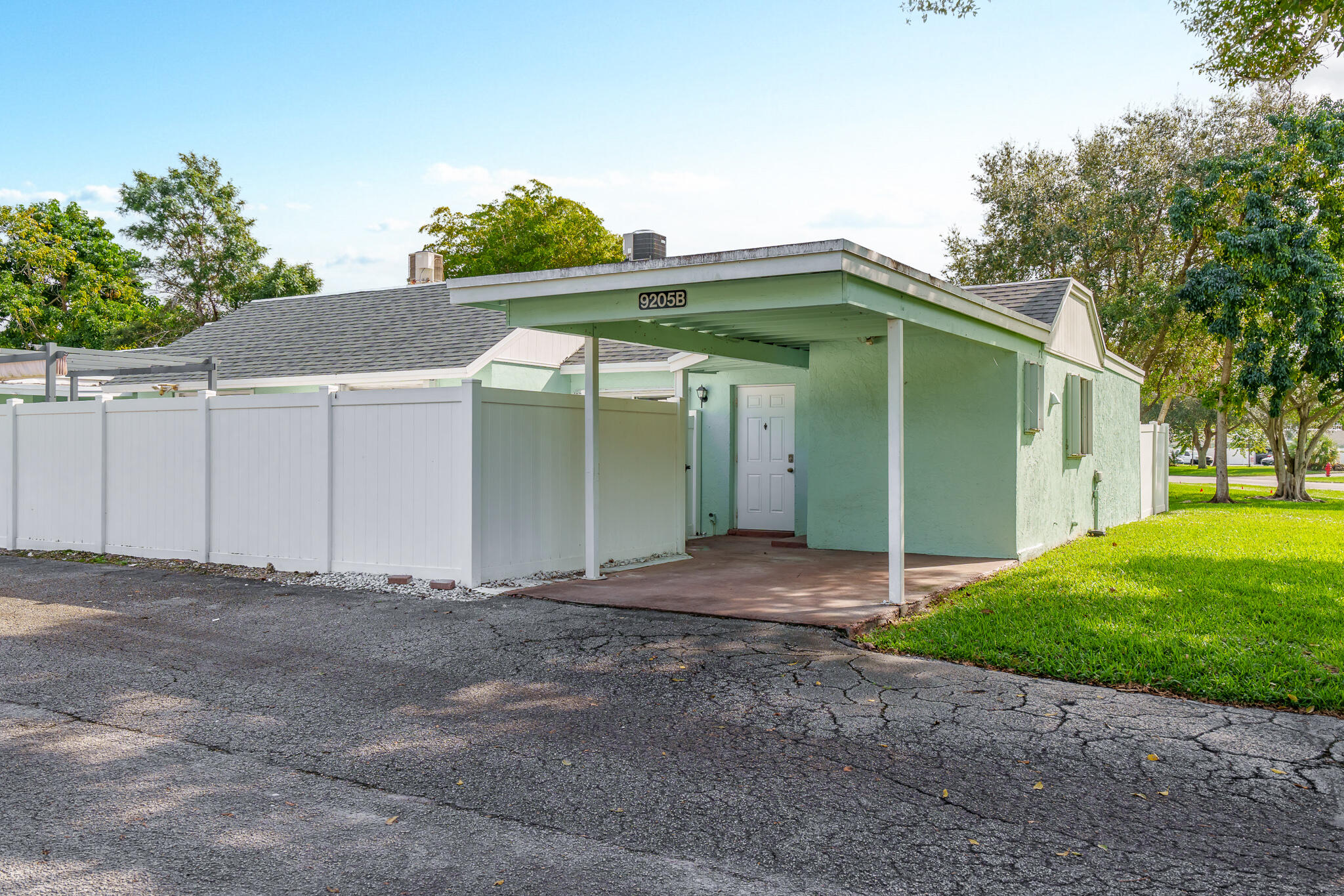 9205 Southwest 5th Street, Unit B Boca Raton, FL 33428 - Photo 2 of 27 Carport