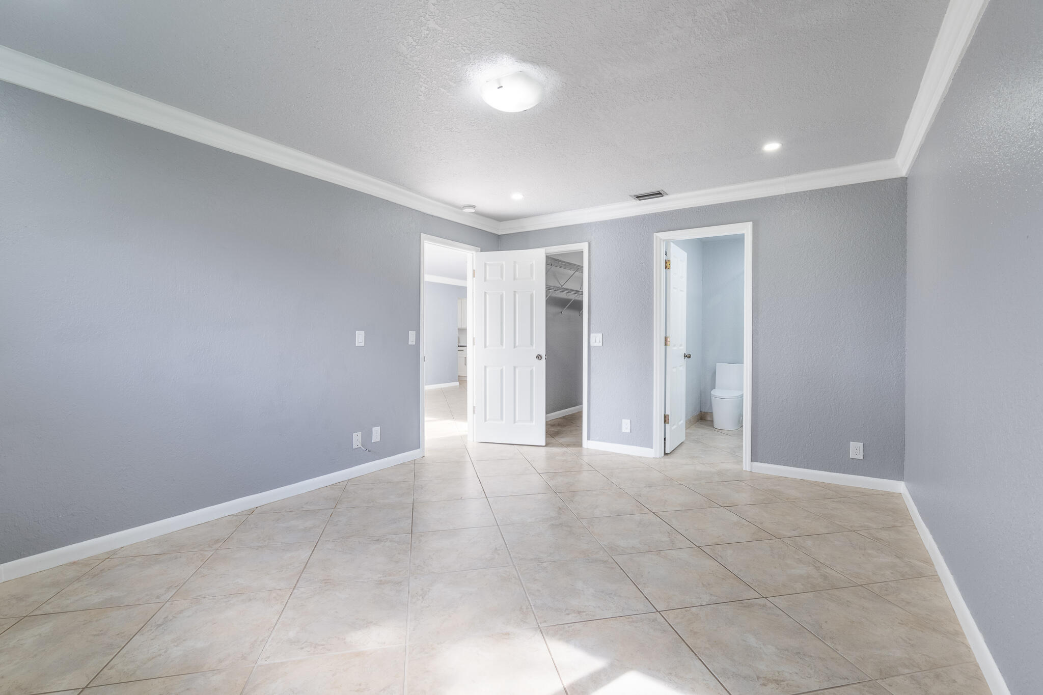 9205 Southwest 5th Street, Unit B Boca Raton, FL 33428 - Photo 10 of 27 Primary Suite