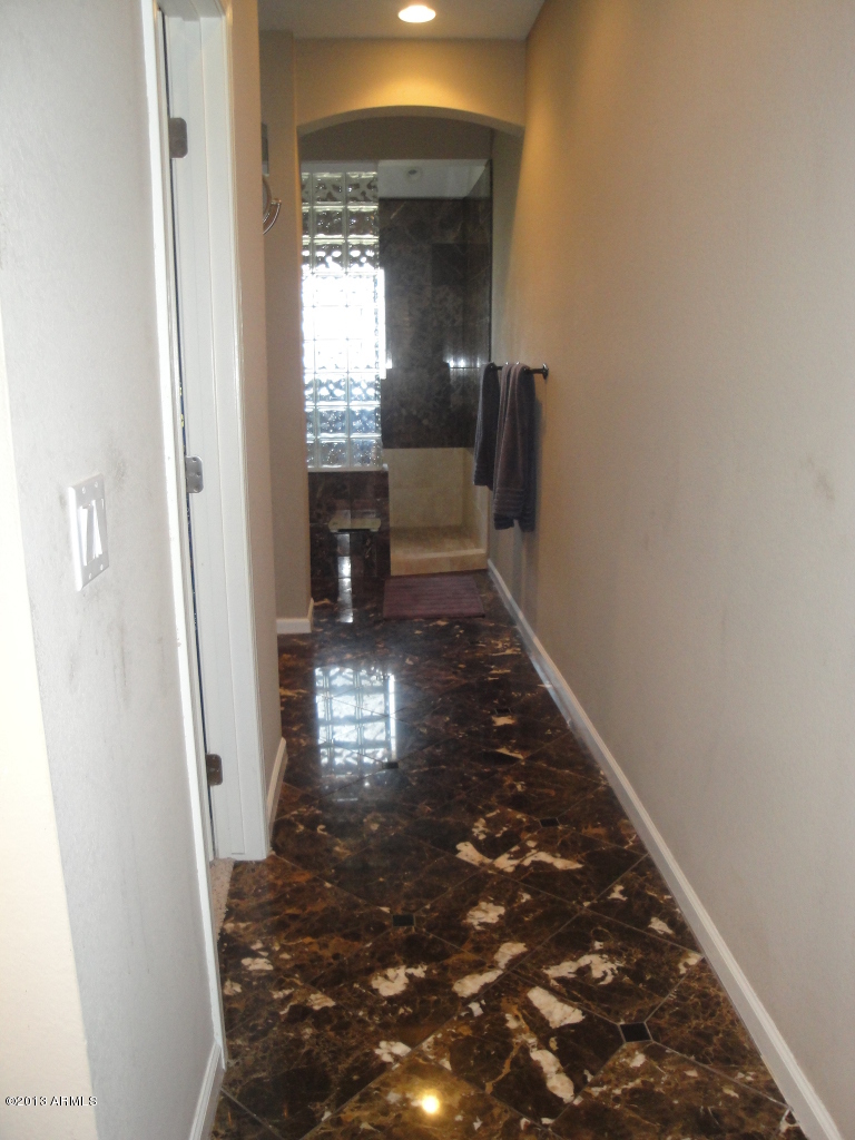 7740 East Gainey Ranch Road, Unit 46 Scottsdale, AZ 85258 - Photo 15 of 21 MARBLE FLOORS
