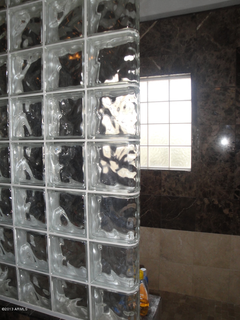 7740 East Gainey Ranch Road, Unit 46 Scottsdale, AZ 85258 - Photo 17 of 21 SNAIL SHOWER IN MASTER