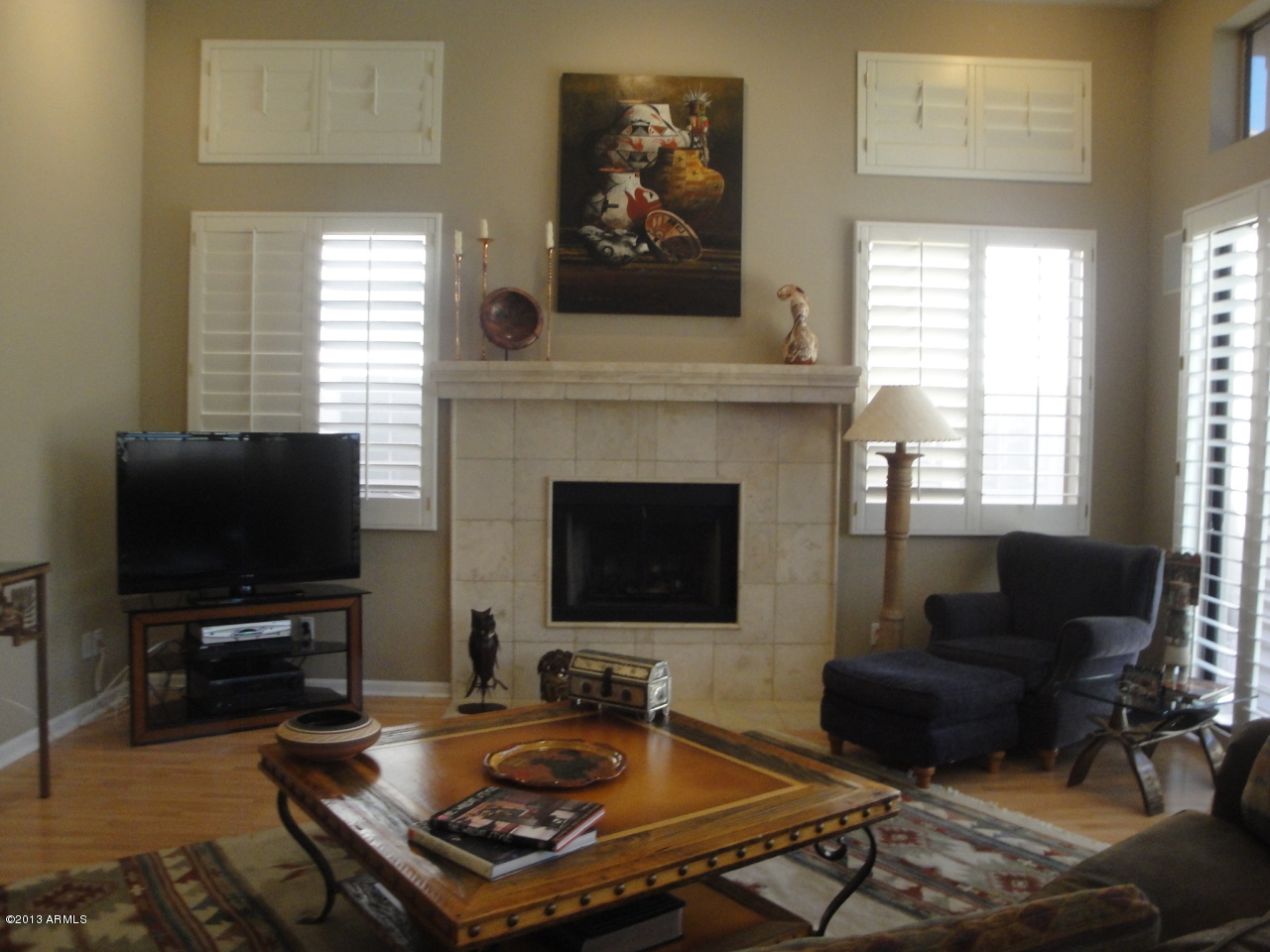 7740 East Gainey Ranch Road, Unit 46 Scottsdale, AZ 85258 - Photo 10 of 21 FIREPLACE IN LIVING ROOM