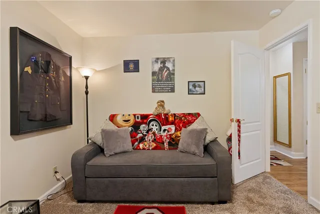 a bed room with a bed and a lamp