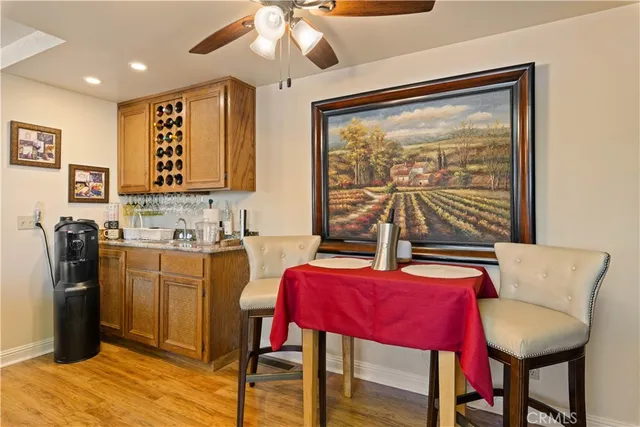 a kitchen with sink cabinets and utility