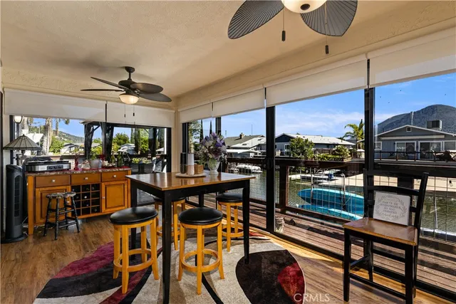 a view of a house with a yard and a large window