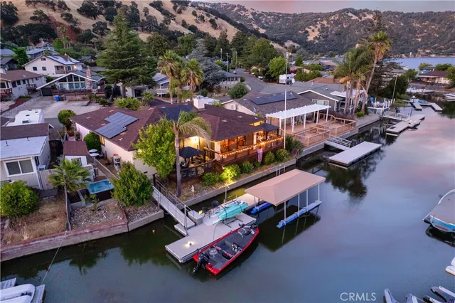 a view of a chairs and table in patio