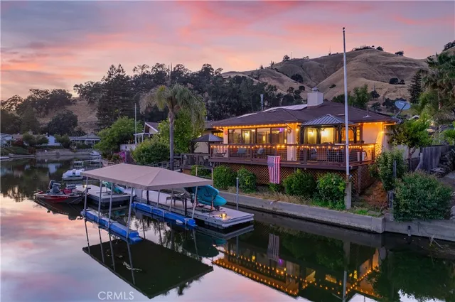 a bedroom with a bed and a table