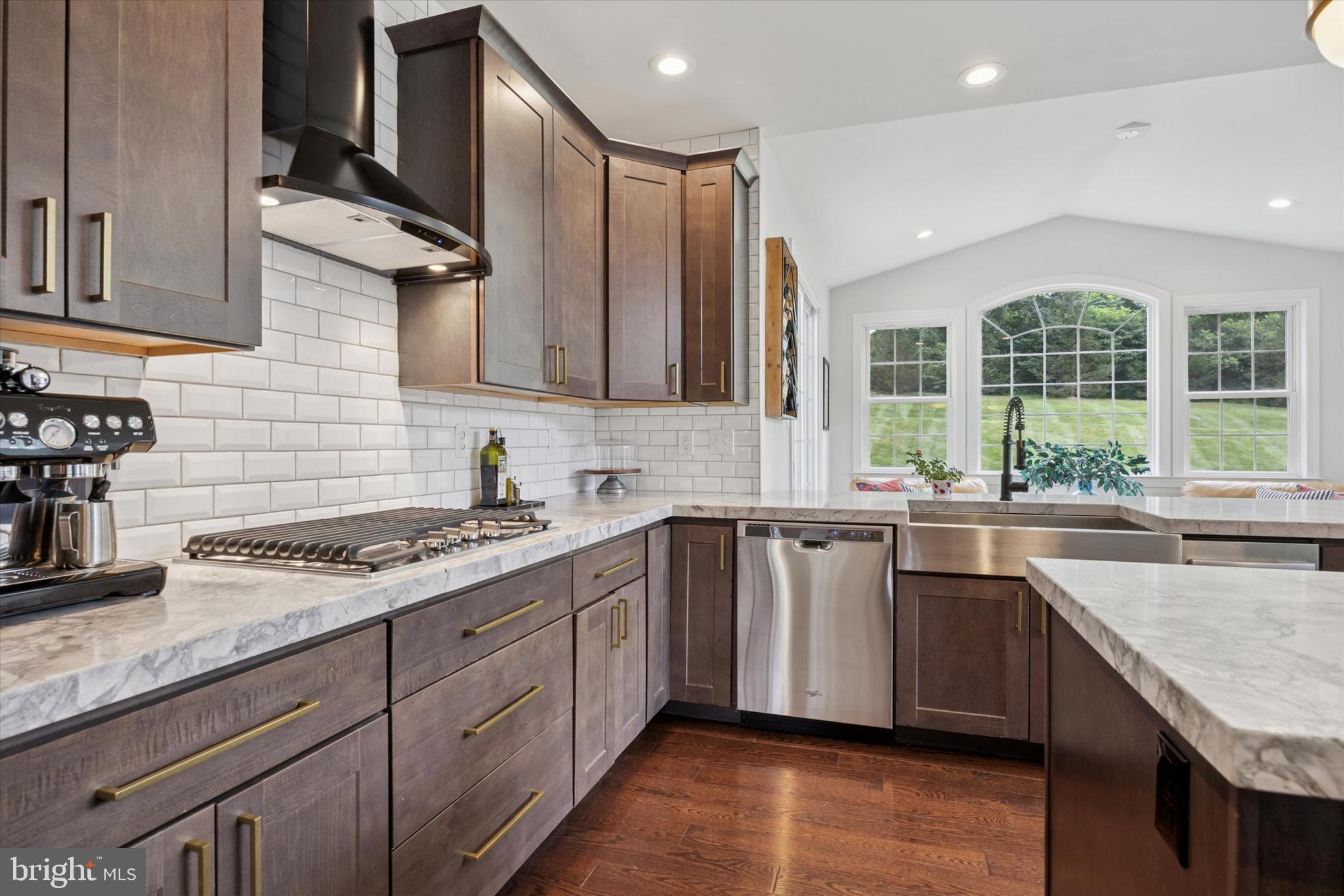 1444 Telegraph Road West Chester, PA 19380 - Photo 13 of 63 a kitchen with stainless steel appliances granite countertop a sink stove and cabinets