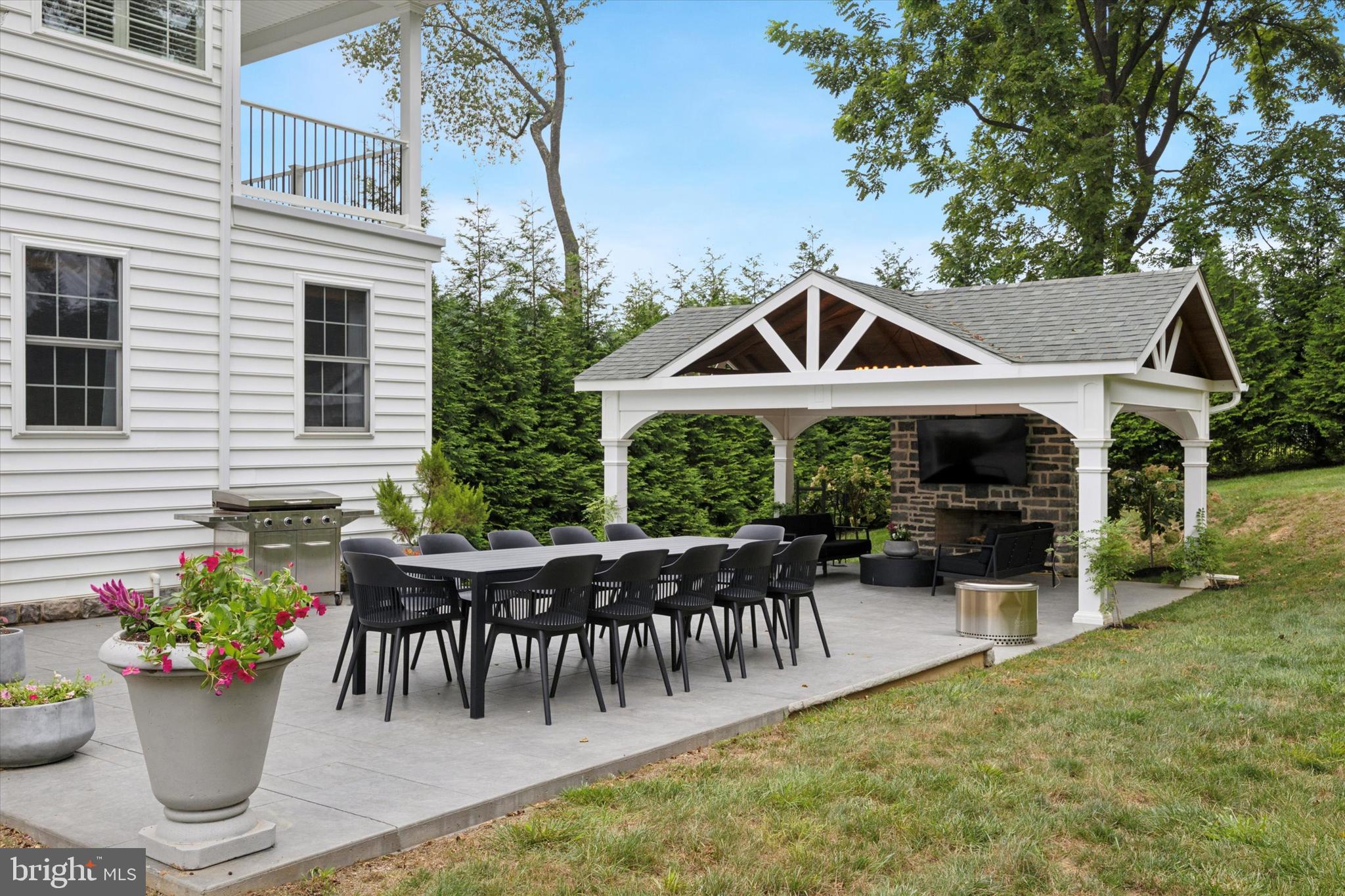 1444 Telegraph Road West Chester, PA 19380 - Photo 17 of 63 a front view of a house with chairs and tables
