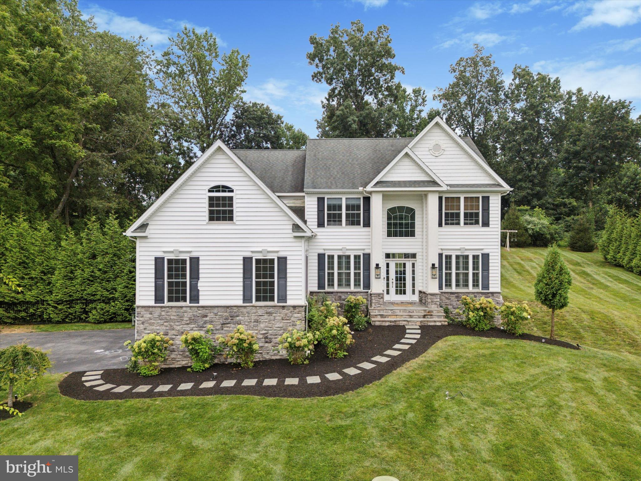 1444 Telegraph Road West Chester, PA 19380 - Photo 3 of 63 a front view of a house with a yard