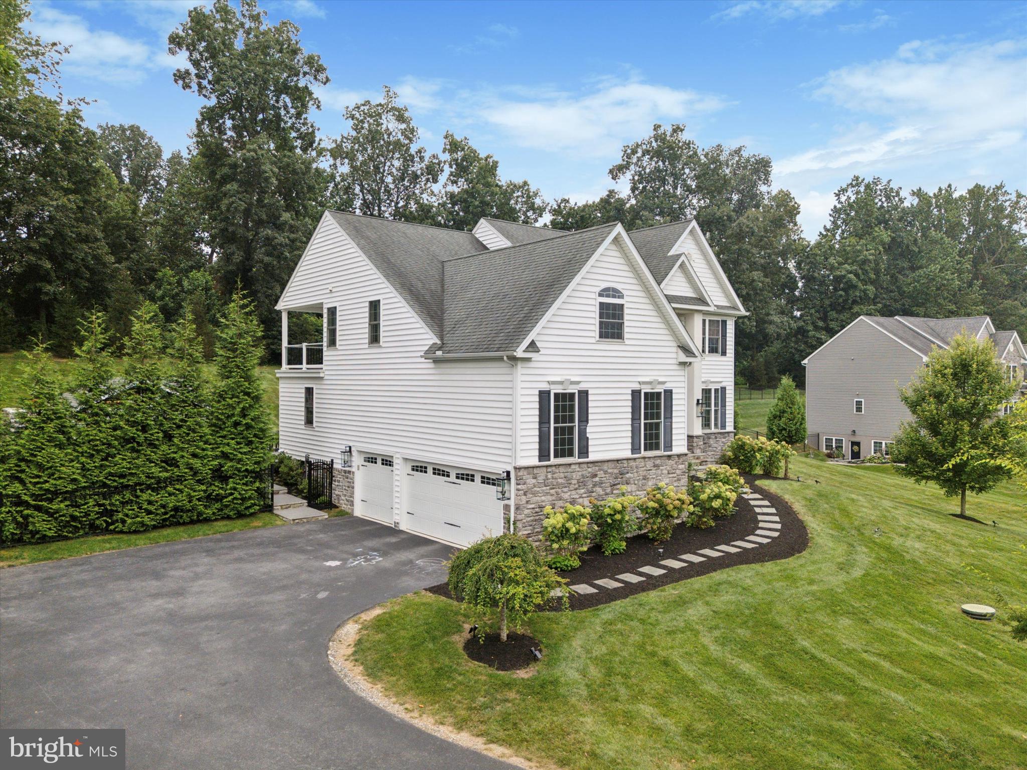 1444 Telegraph Road West Chester, PA 19380 - Photo 50 of 63 a view of a house with a yard