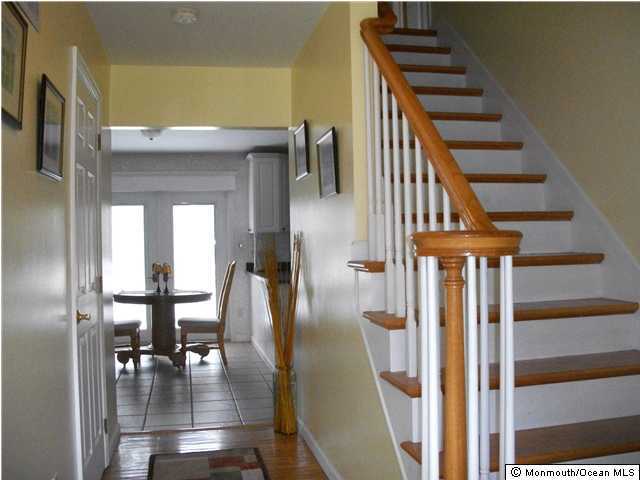 39 East Pleasant Grove Road Jackson, NJ 08527 - Photo 2 of 3 a view of entryway and hall with wooden floor