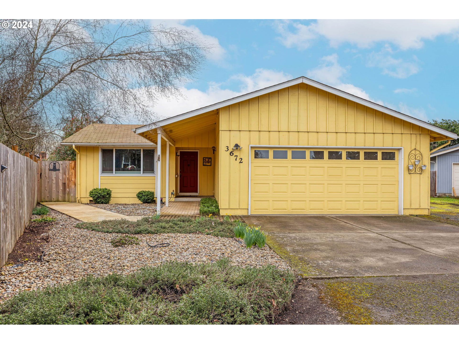 a view of front of house with garage