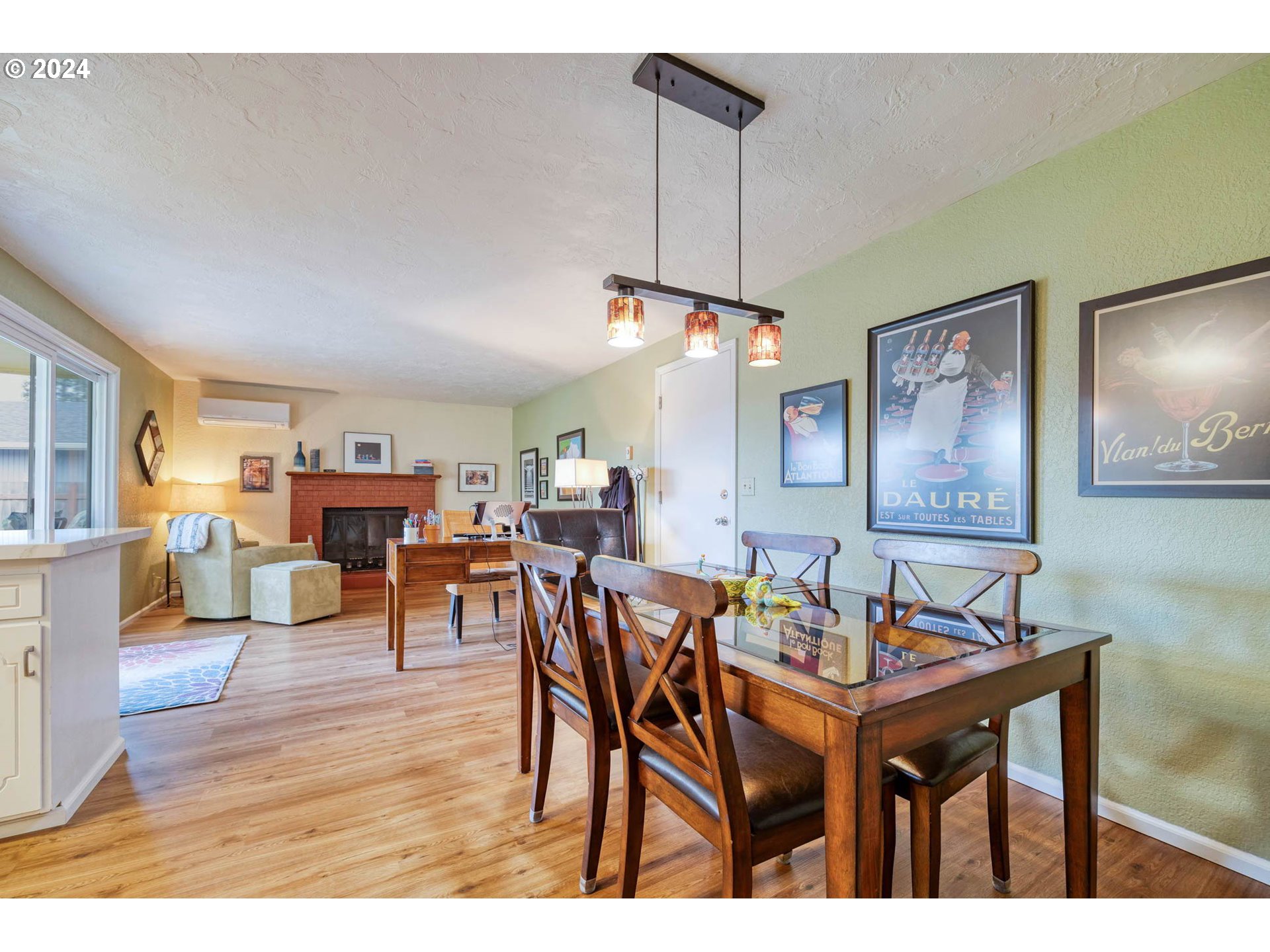 3672 Harlow Road Eugene, OR 97401 - Photo 14 of 36 a view of a dining room with furniture and wooden floor