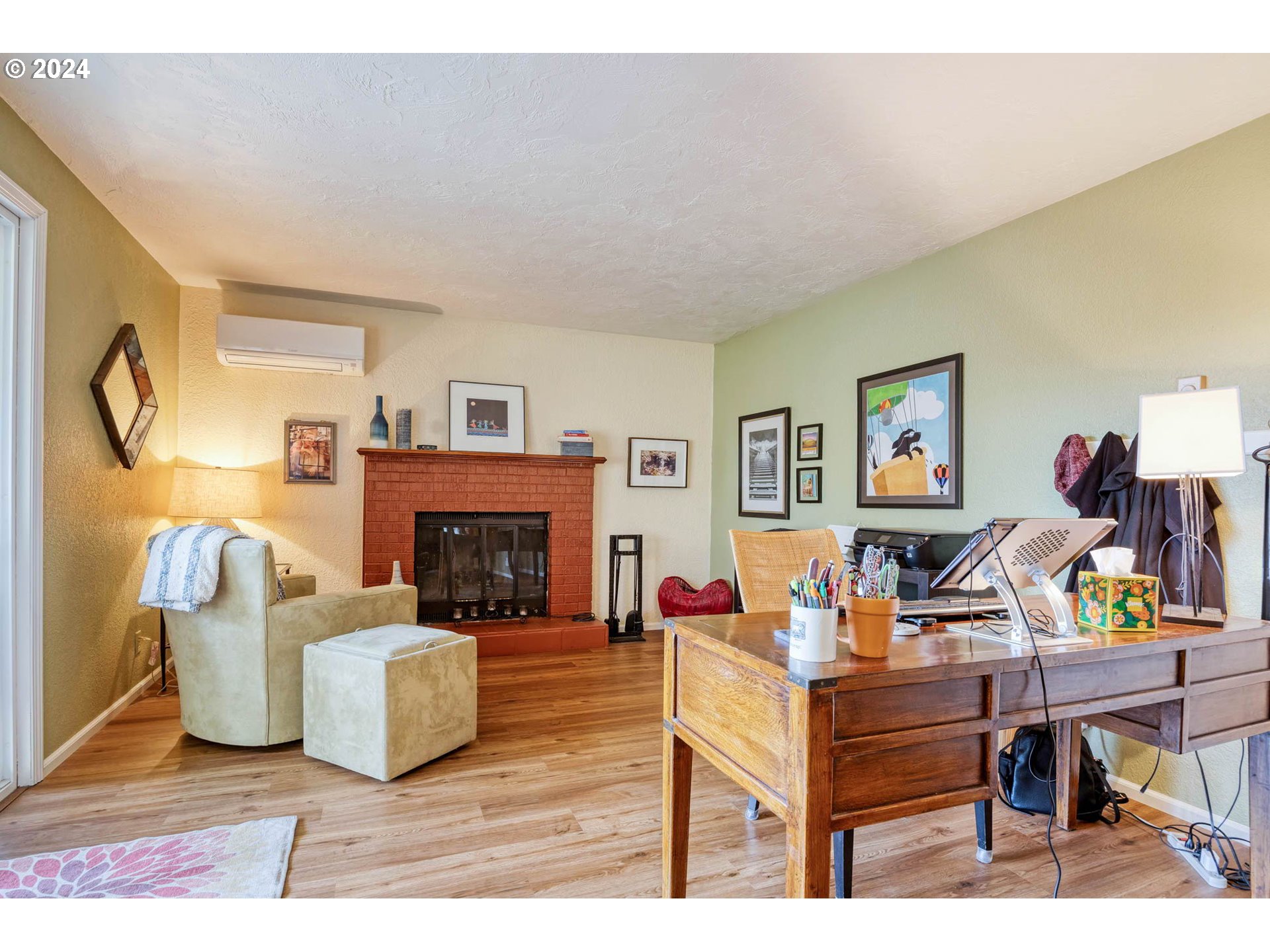 3672 Harlow Road Eugene, OR 97401 - Photo 15 of 36 a living room with furniture and a fireplace