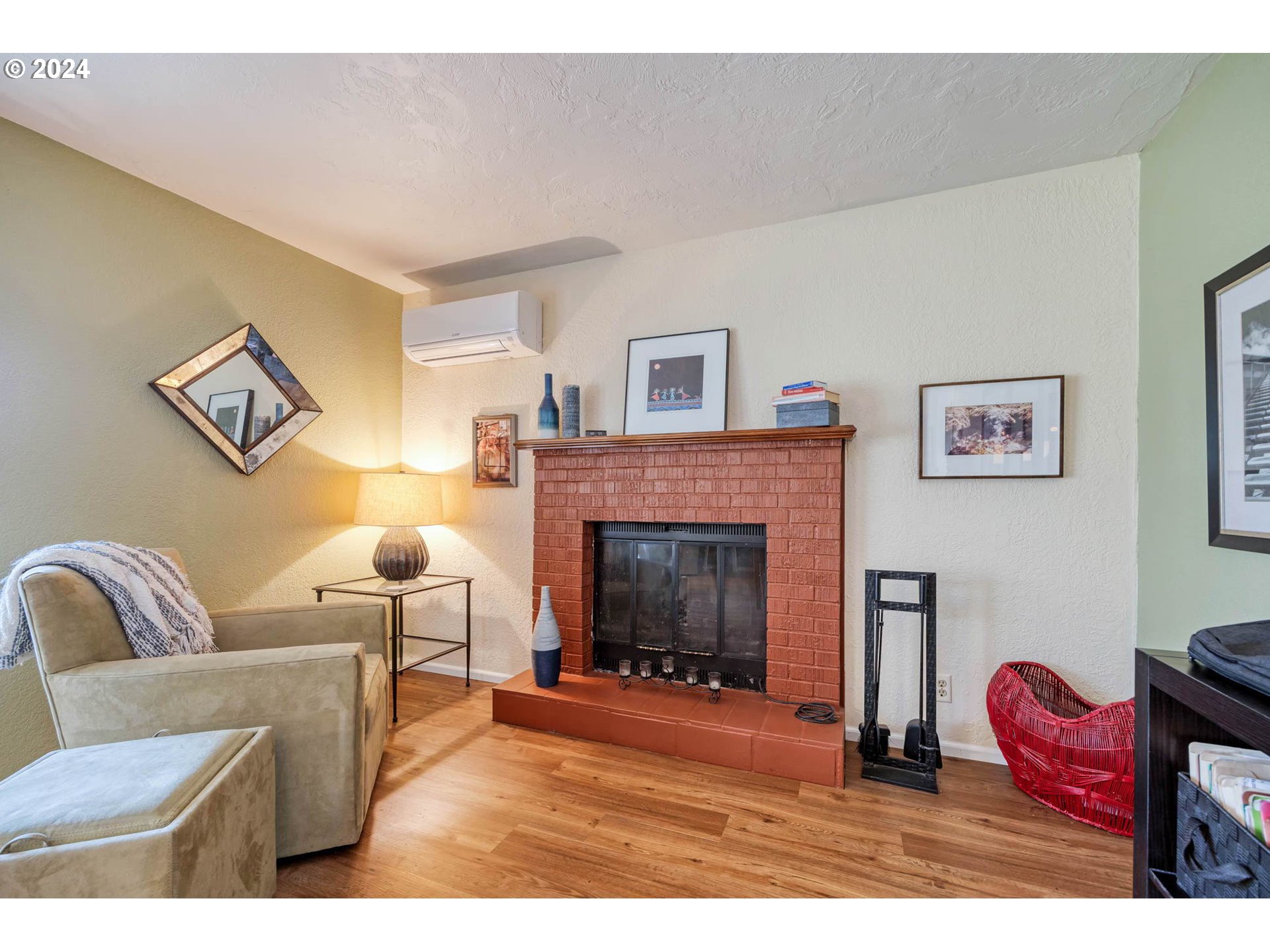3672 Harlow Road Eugene, OR 97401 - Photo 17 of 36 a living room with furniture and a fireplace