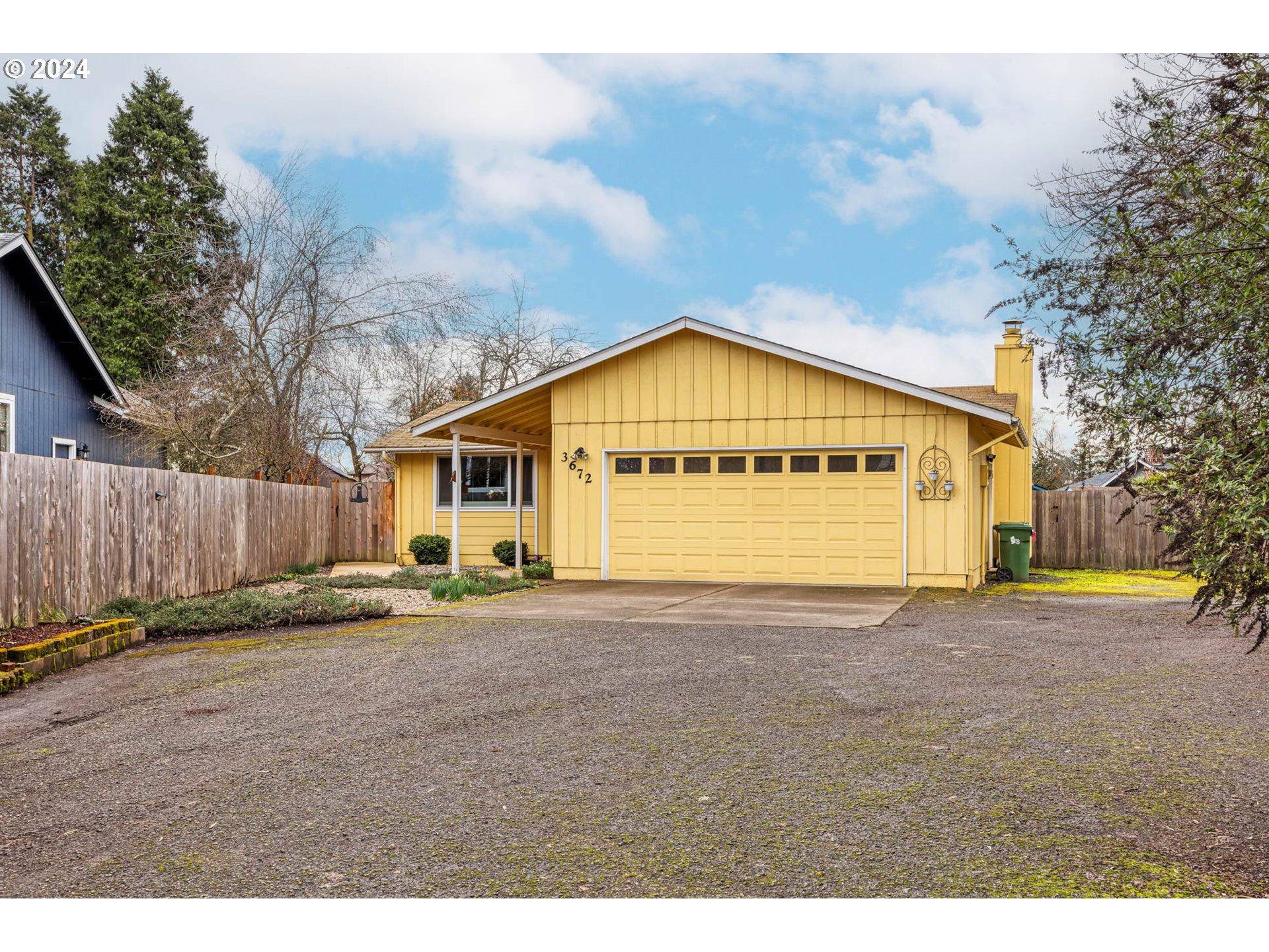 3672 Harlow Road Eugene, OR 97401 - Photo 2 of 36 a view of a house with a yard and fence