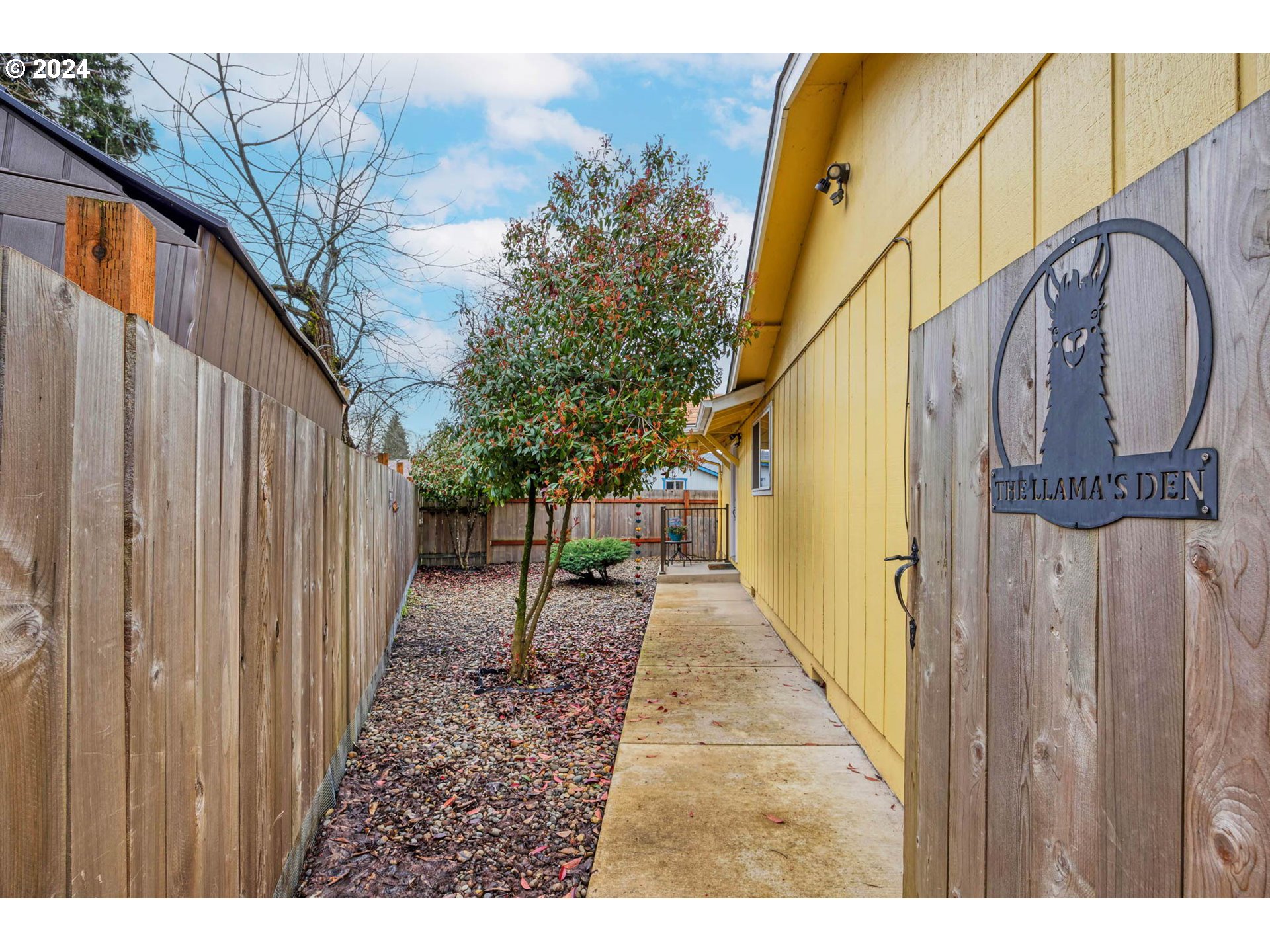 3672 Harlow Road Eugene, OR 97401 - Photo 27 of 36 a view of a pathway of a house with a fountain