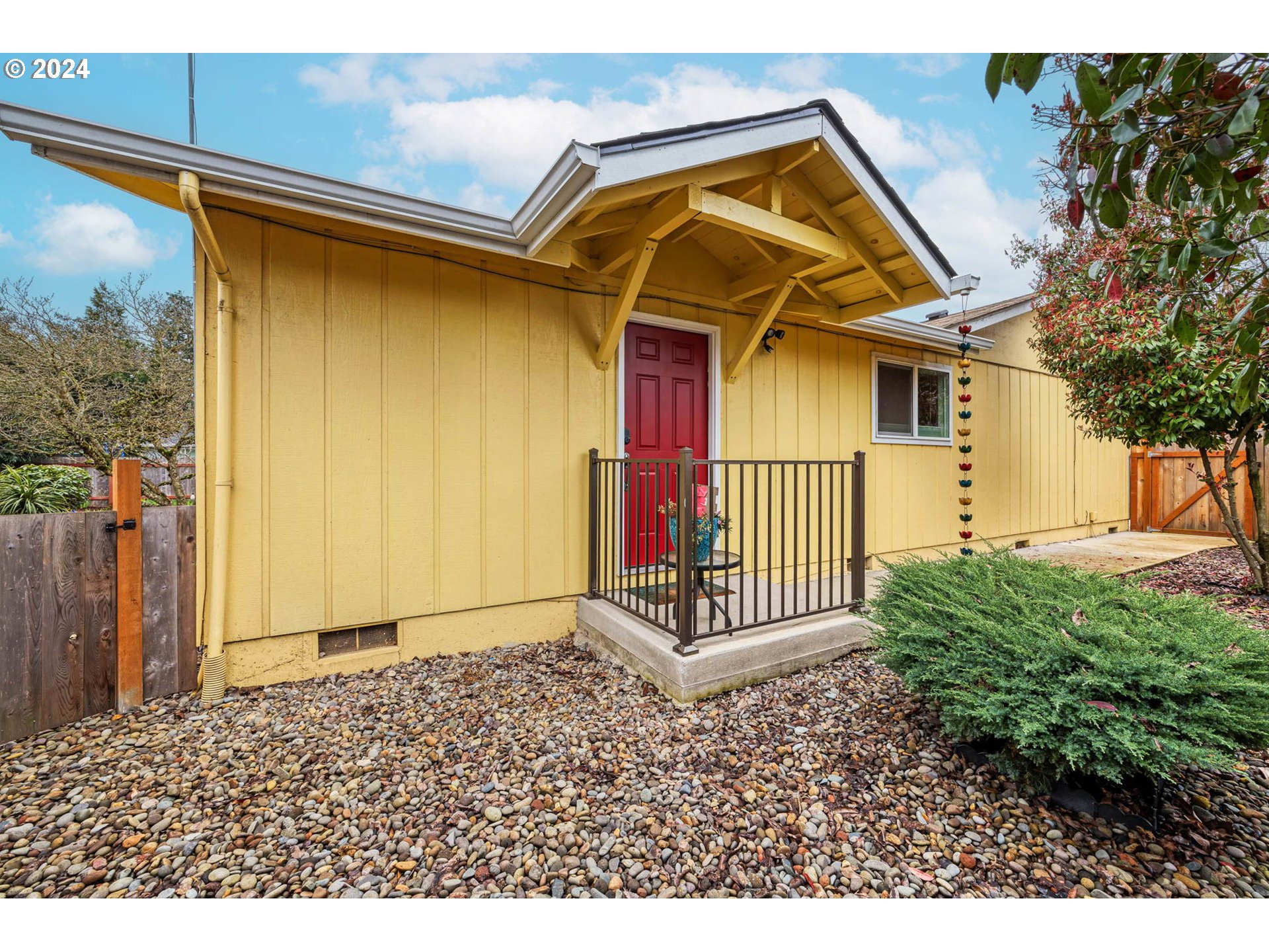3672 Harlow Road Eugene, OR 97401 - Photo 28 of 36 a view of a house with a small cabin