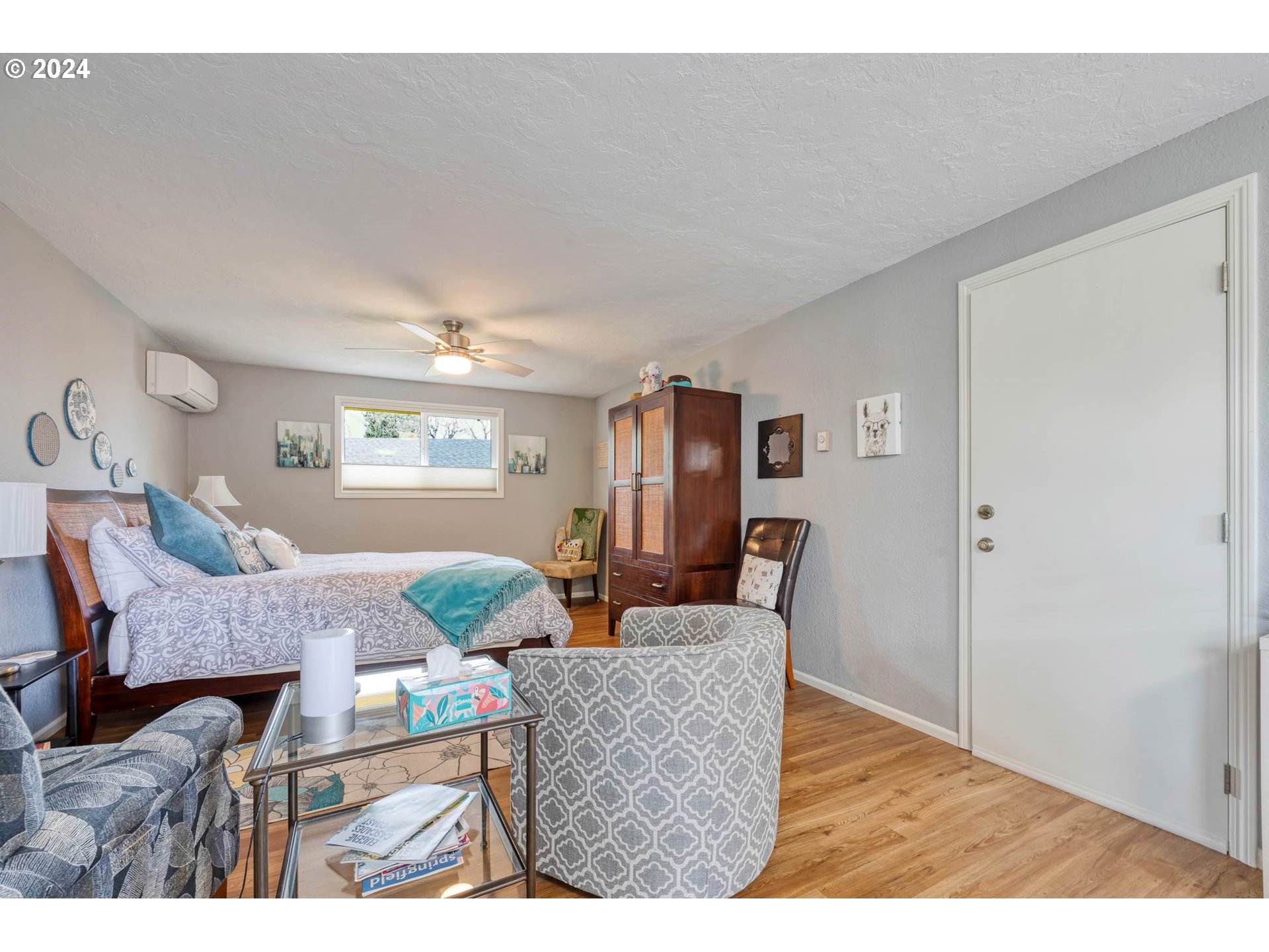 3672 Harlow Road Eugene, OR 97401 - Photo 32 of 36 a living room with furniture and wooden floor