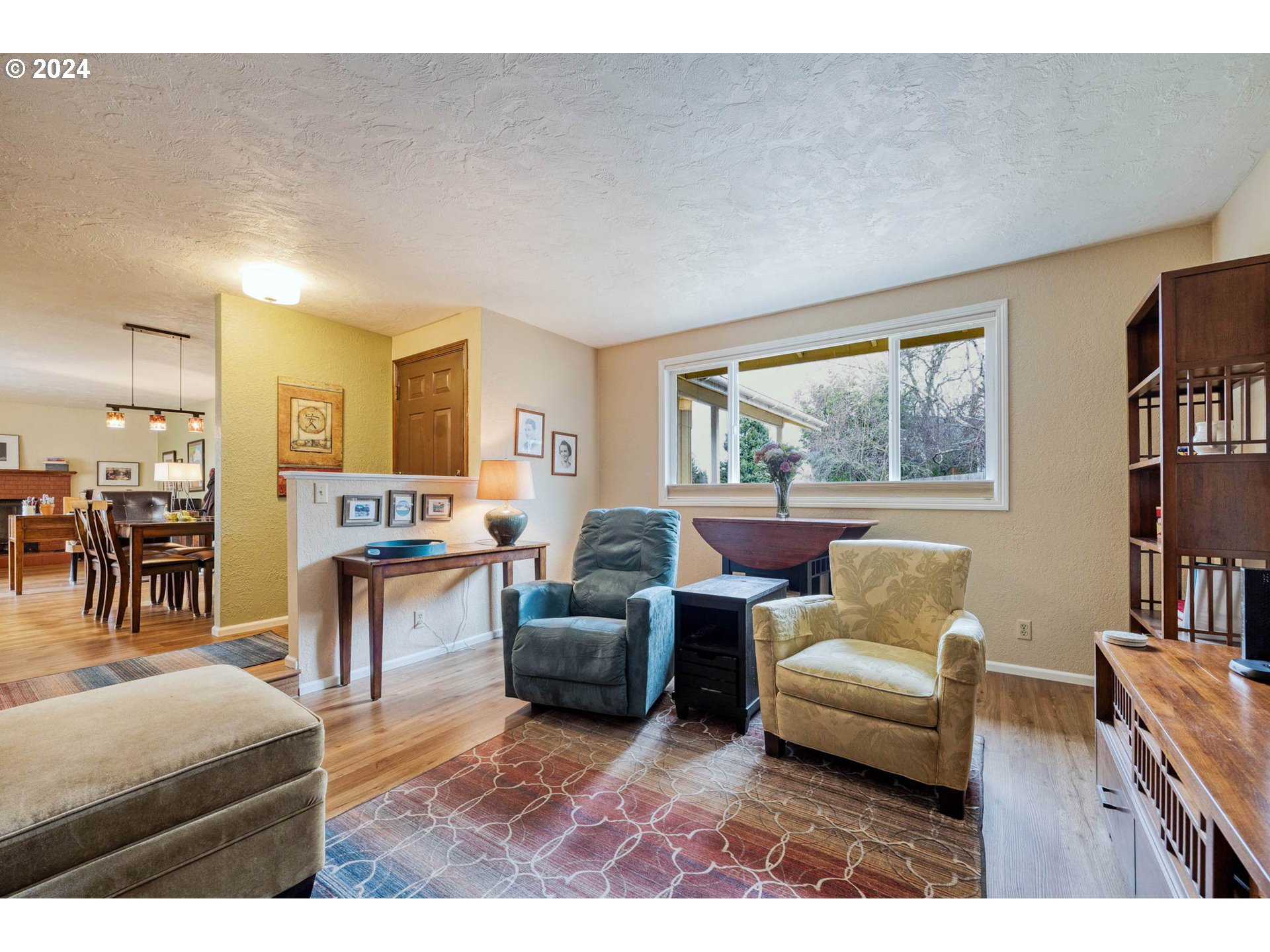 3672 Harlow Road Eugene, OR 97401 - Photo 5 of 36 a living room with furniture and a window