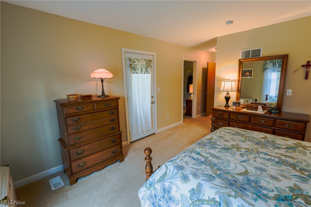 533 Middle Road Conneaut, OH 44030 - Photo 25 of 46 Bedroom with light colored carpet and a closet