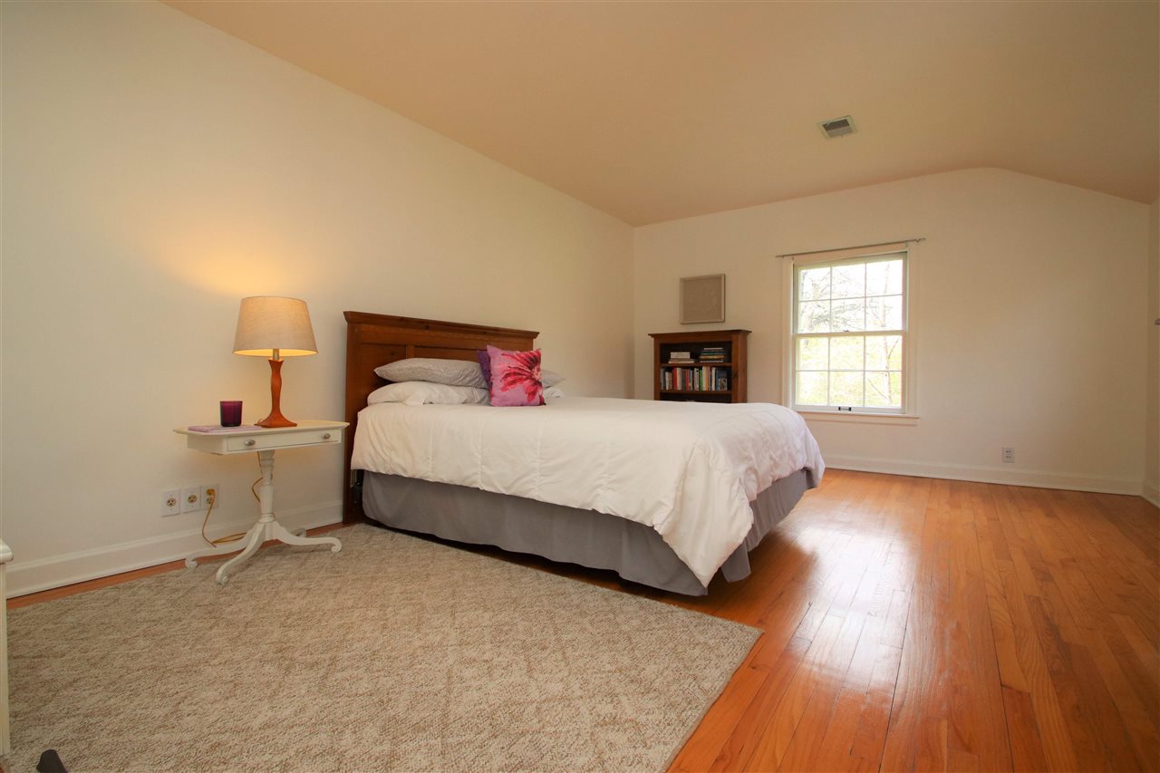 2903 Spring Creek Road Rockford, IL 61107 - Photo 35 of 39 a spacious bedroom with a bed and window