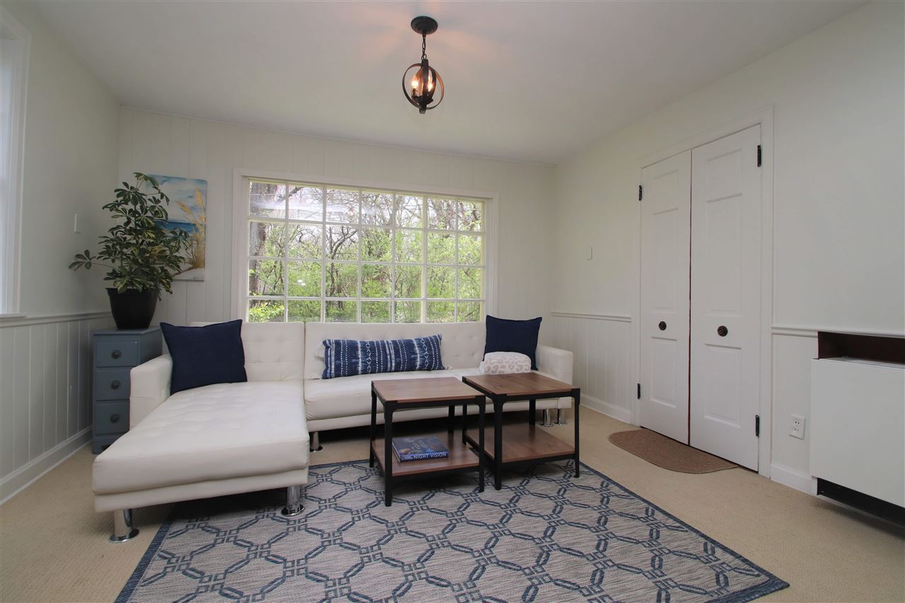 2903 Spring Creek Road Rockford, IL 61107 - Photo 5 of 39 a living room with furniture and a window