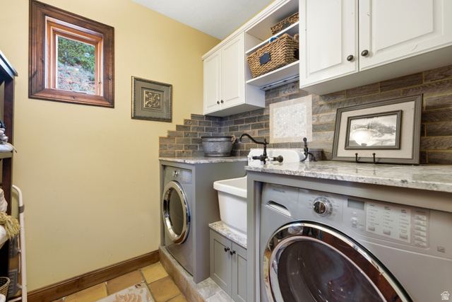 335 Bern Way Midway, UT 84049 - Photo 74 of 88 Laundry area featuring two front-loading machines, a utility sink, and ample counter space