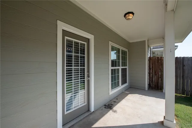 a view of a backyard of the house