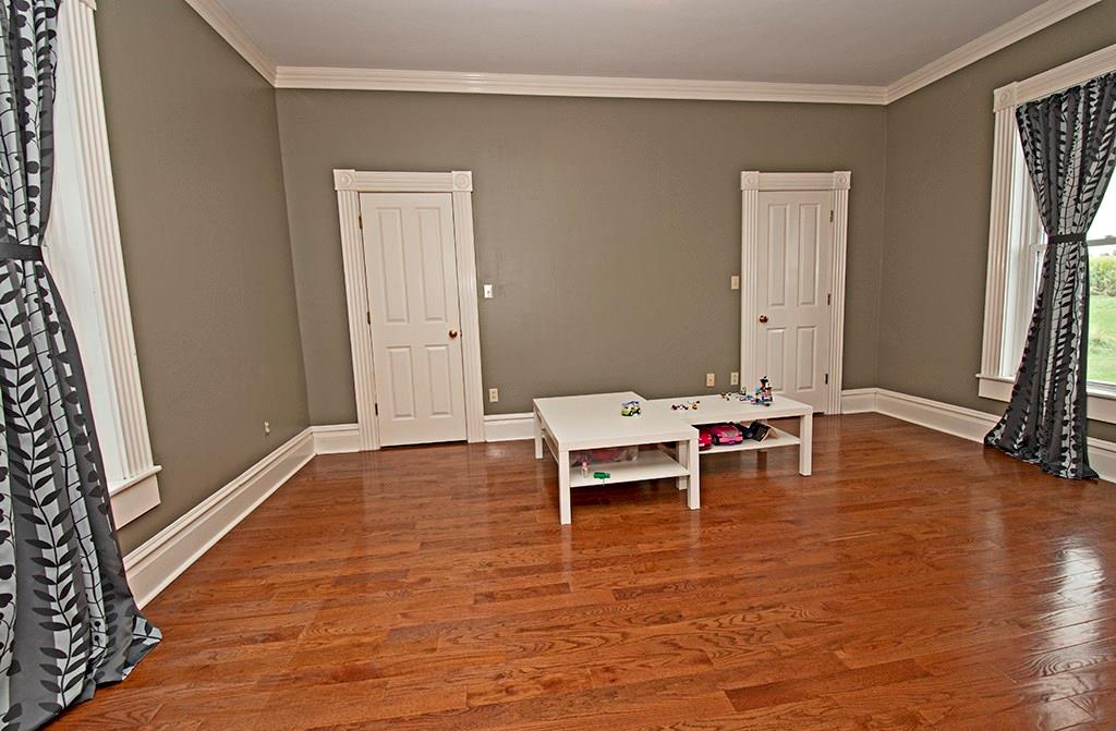 354 Scott Ridge Road Harmony, PA 16037 - Photo 12 of 22 3rd Bedroom with 3 closets , hardwood floors. Presently childrens playroom