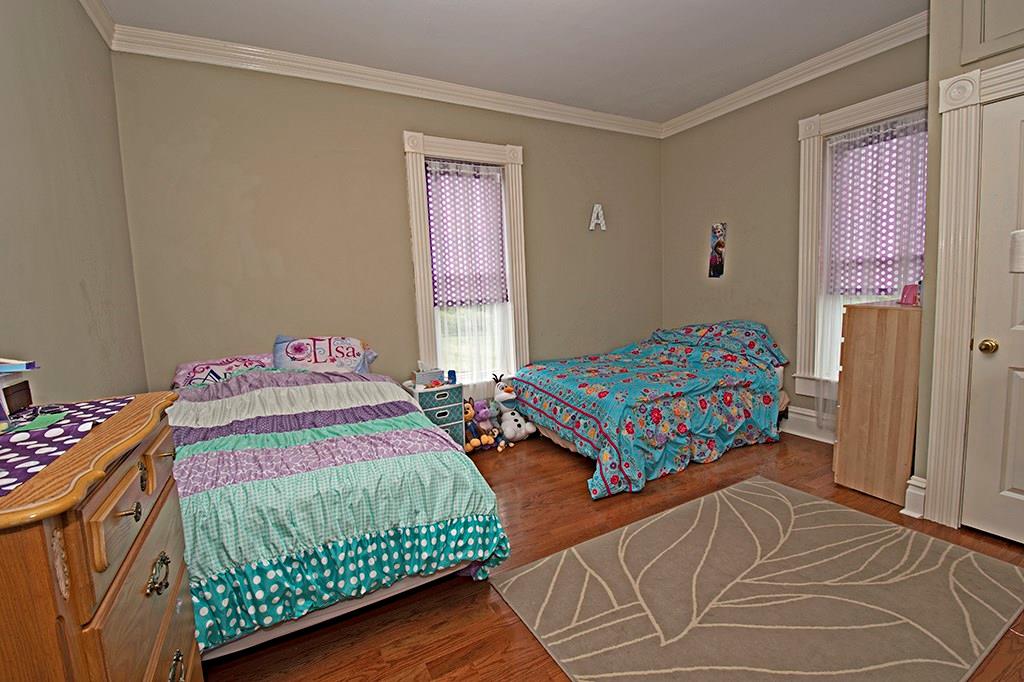 354 Scott Ridge Road Harmony, PA 16037 - Photo 10 of 22 Bedroom with closet and hardwood floors.