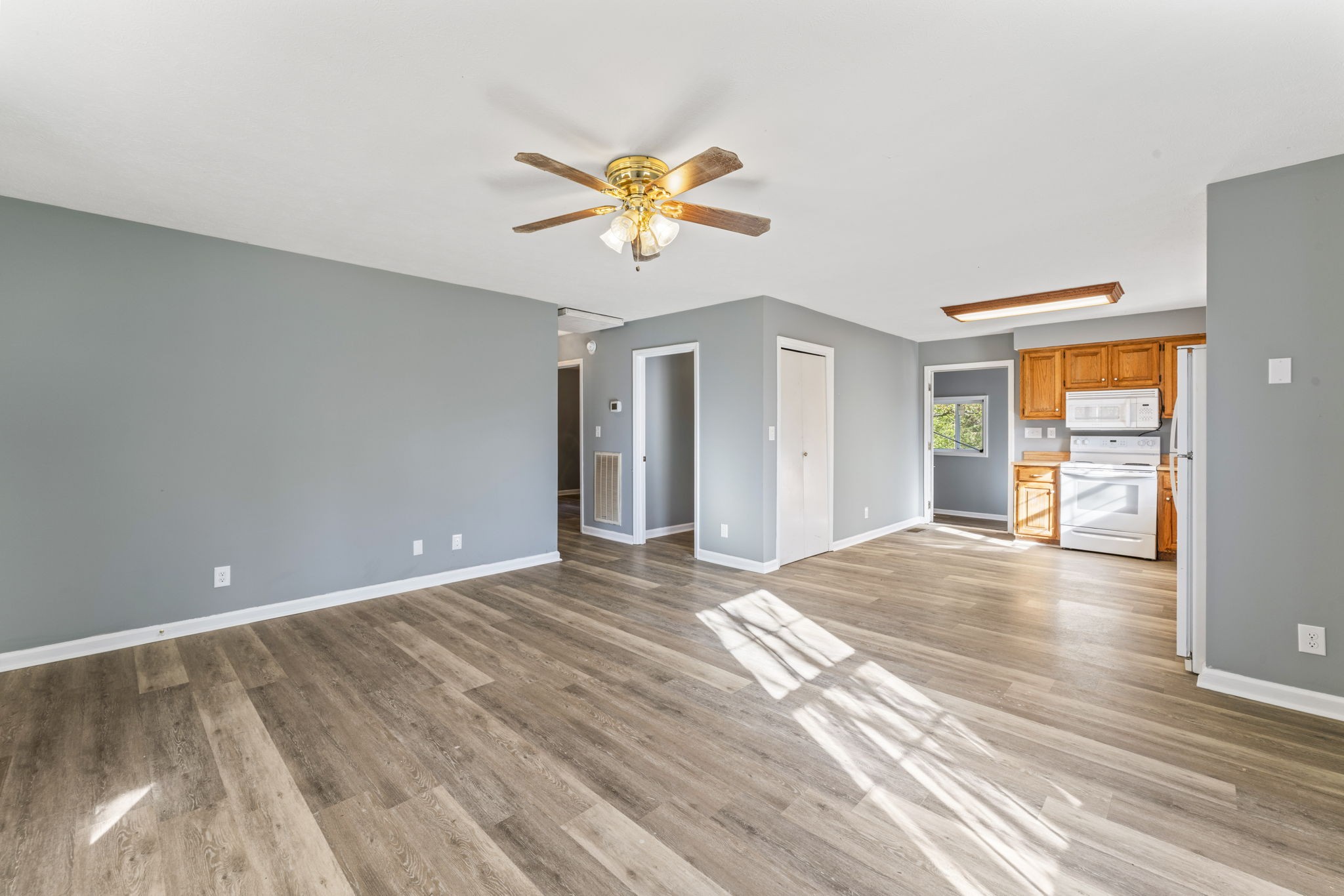7736 Dice Lampley Road Fairview, TN 37062 - Photo 11 of 27 a view of an empty room with window and wooden floor