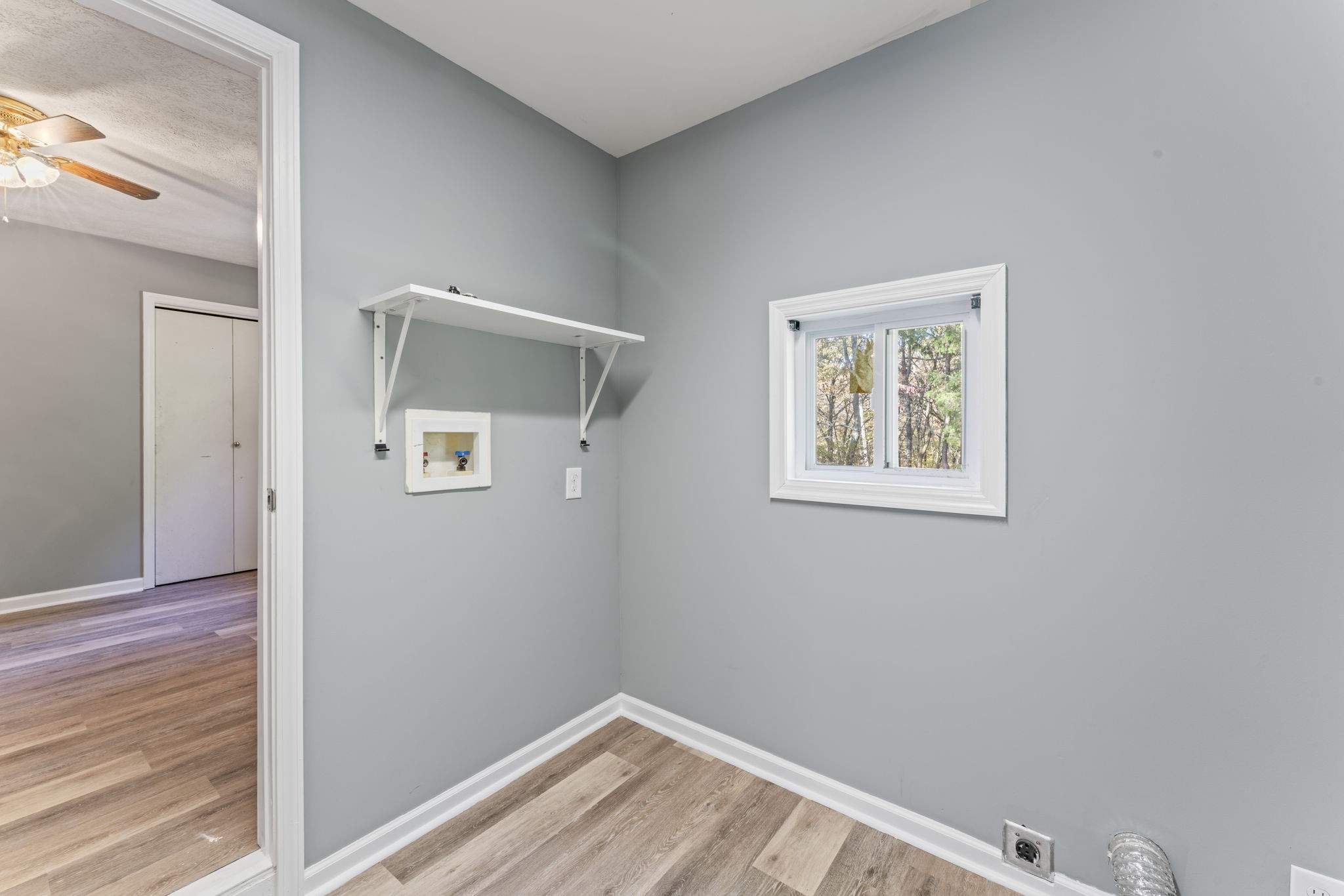 7736 Dice Lampley Road Fairview, TN 37062 - Photo 17 of 27 a view of empty room with wooden floor
