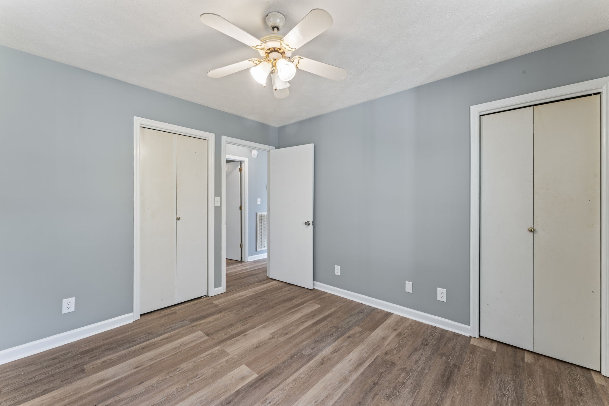 7736 Dice Lampley Road Fairview, TN 37062 - Photo 21 of 27 a view of an empty room with wooden floor
