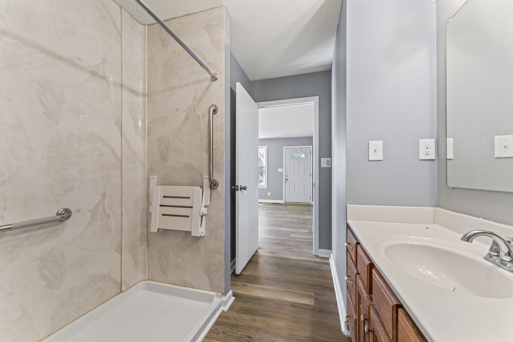 7736 Dice Lampley Road Fairview, TN 37062 - Photo 23 of 27 a bathroom with a sink and mirror