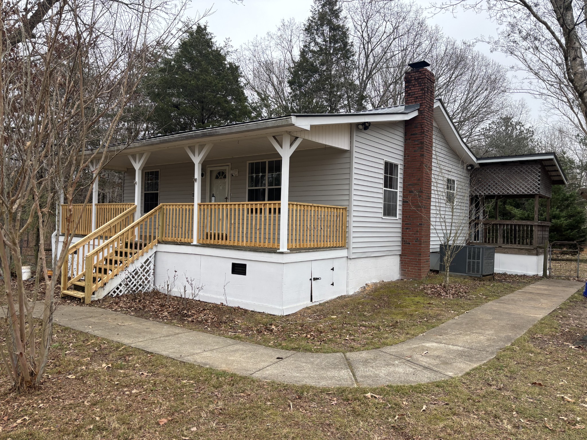 7736 Dice Lampley Road Fairview, TN 37062 - Photo 5 of 27 a front view of a house with a yard