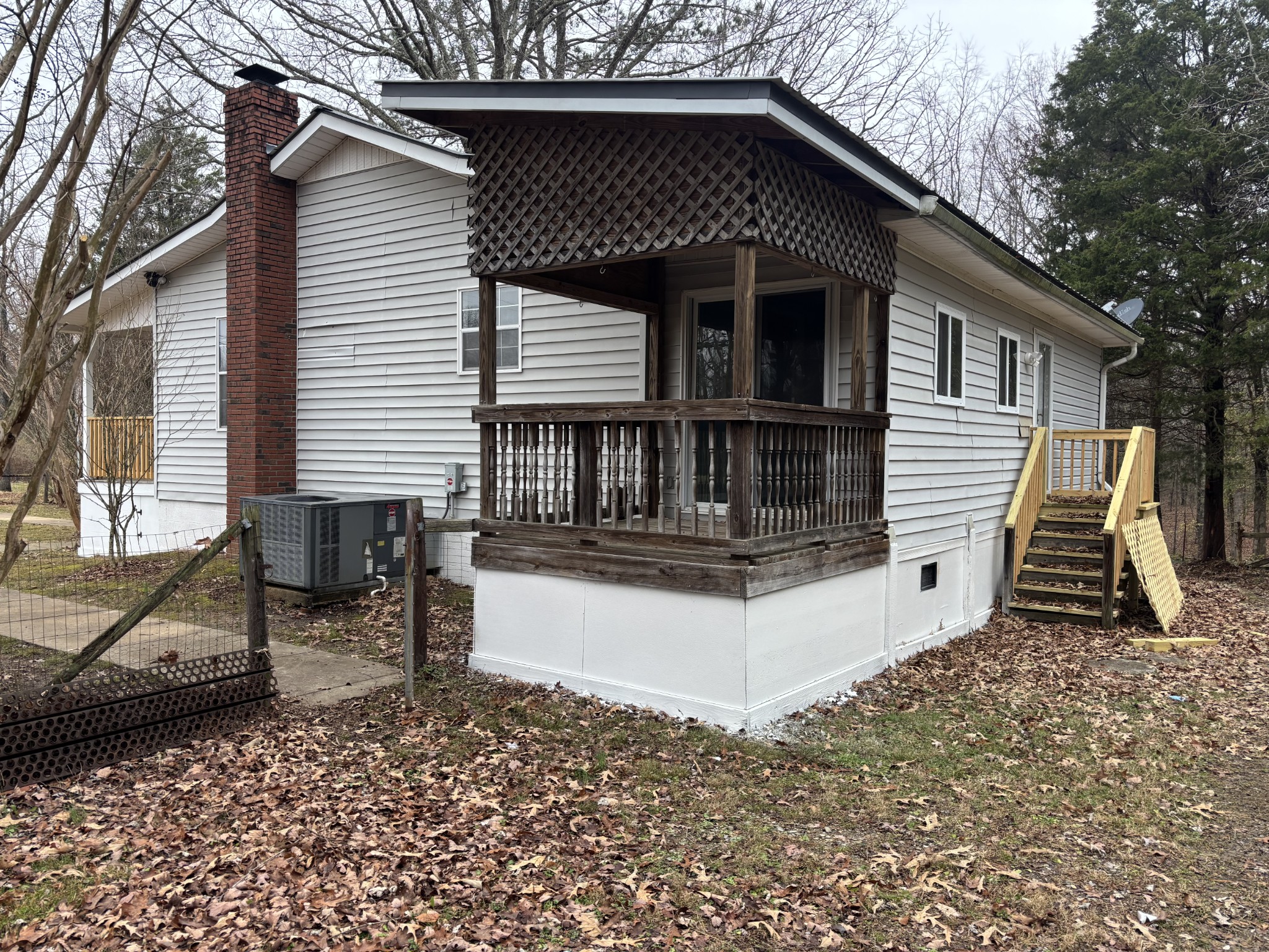 7736 Dice Lampley Road Fairview, TN 37062 - Photo 6 of 27 a view of a house with a balcony