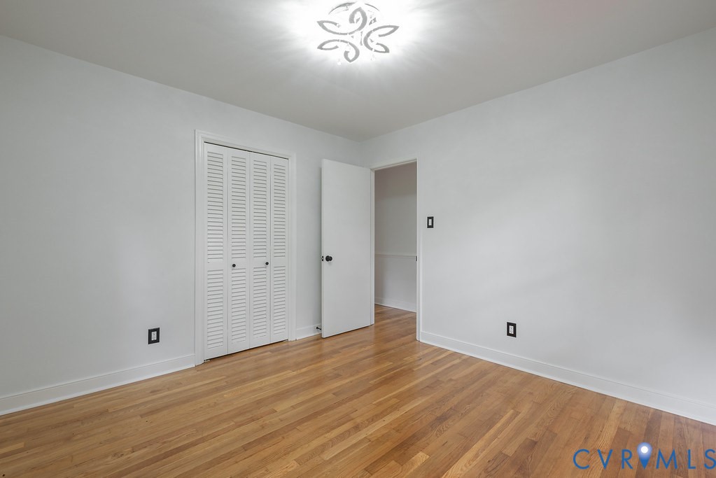 11840 Winfore Drive Midlothian, VA 23113 - Photo 20 of 40 Room featuring wood-finish flooring, white walls,
