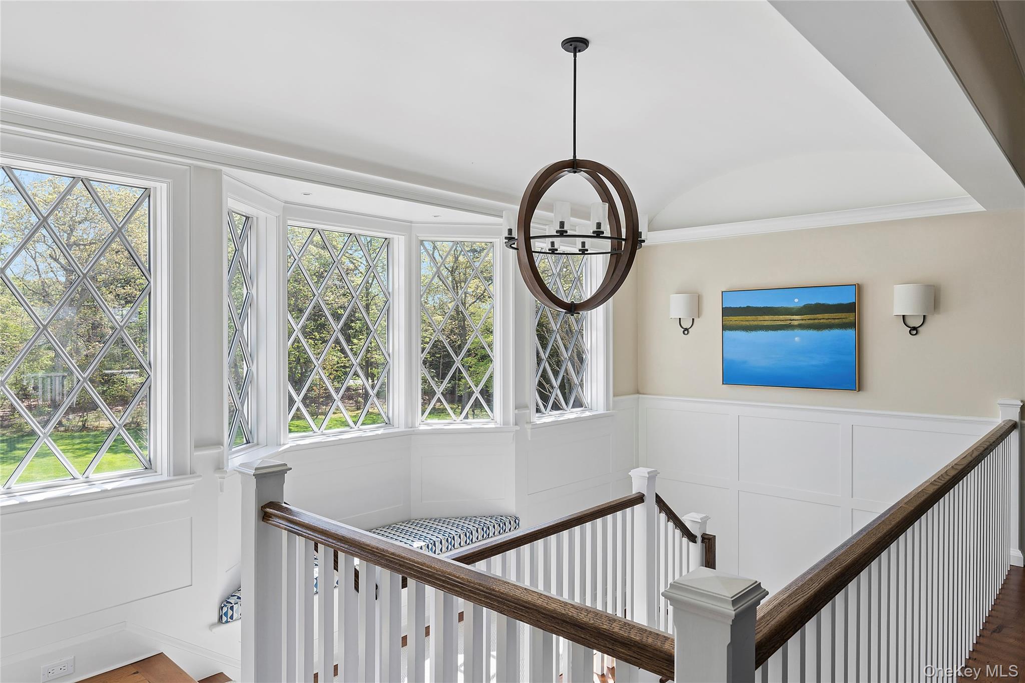 43 Old Main Road Quogue, NY 11959 - Photo 15 of 28 a view of a hallway with windows