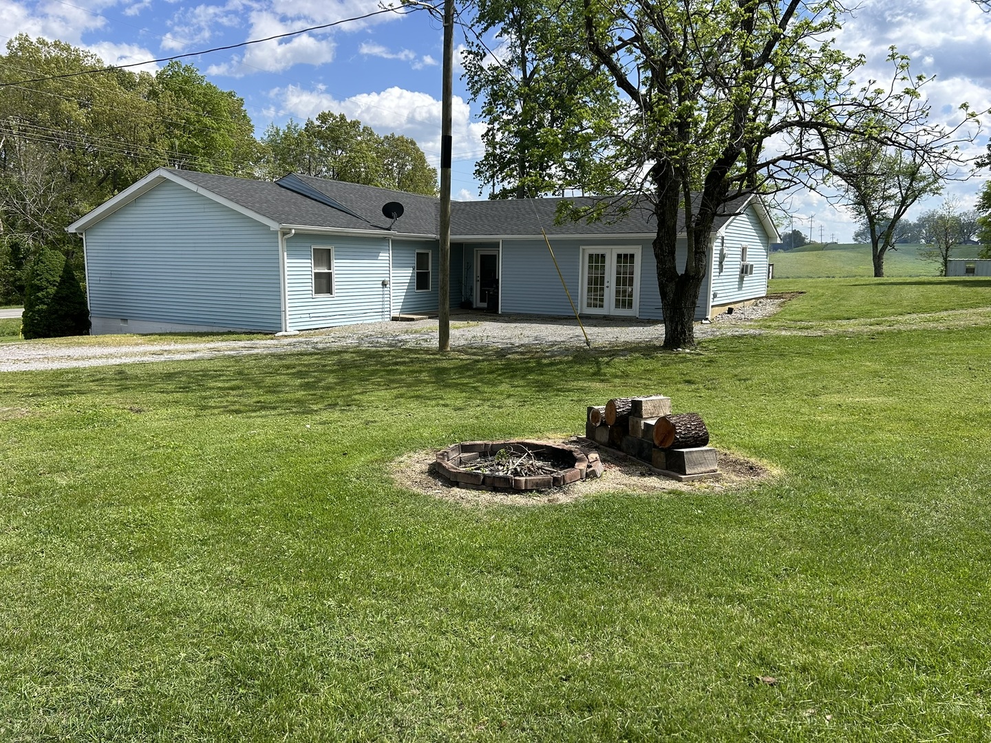 1 Bushwack Road Golconda, IL 62938 - Photo 12 of 38 a view of a house with a backyard and trees