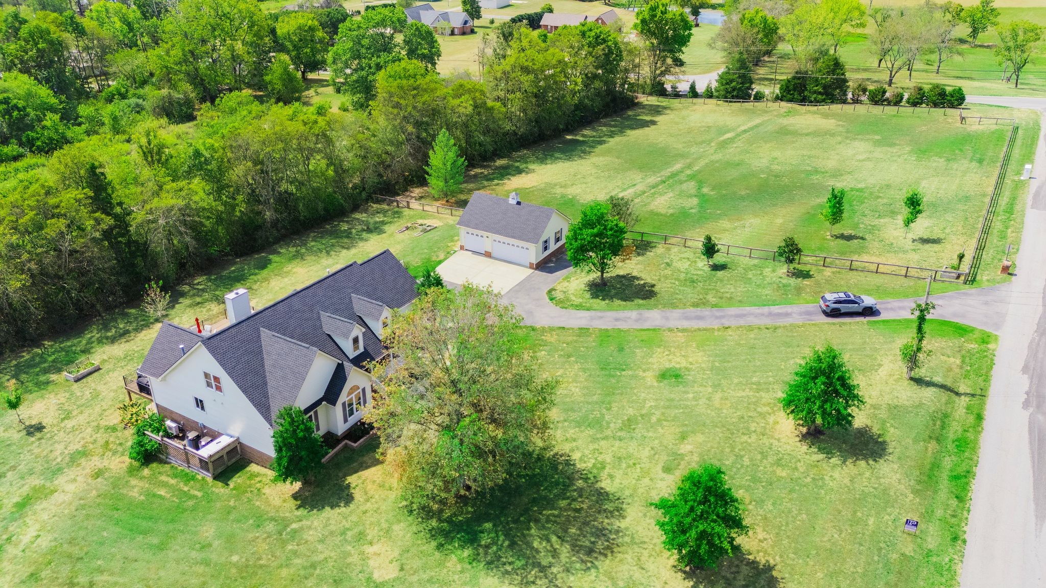 1055 Franklin Road Gallatin, TN 37066 - Photo 2 of 60 an aerial view of residential houses with outdoor space and street view